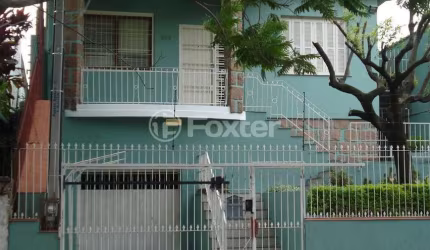 Casa com 3 quartos à venda na Rua Guilherme Schell, 253, Santo Antônio, Porto Alegre, 233 m2 por R$ 770.000