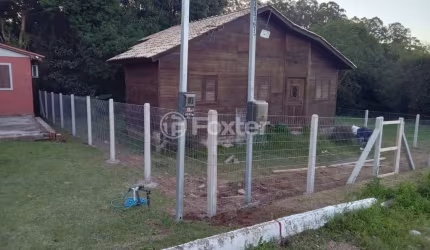 Casa com 2 quartos à venda na Rua Antônio C ávila, 50, Tarumã, Viamão, 65 m2 por R$ 145.000
