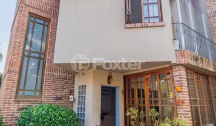 Casa em condomínio fechado com 3 quartos à venda na Rua João Mendes Ouriques, 570, Jardim Isabel, Porto Alegre, 166 m2 por R$ 690.000