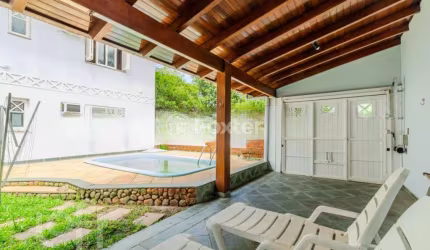 Casa em condomínio fechado com 5 quartos à venda na Avenida Juca Batista, 1200, Belém Novo, Porto Alegre, 300 m2 por R$ 1.250.000