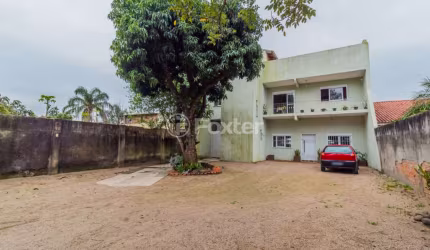 Casa comercial com 2 salas à venda na Rua Jerolomo Minuzo, 464, Vila Nova, Porto Alegre, 331 m2 por R$ 799.000