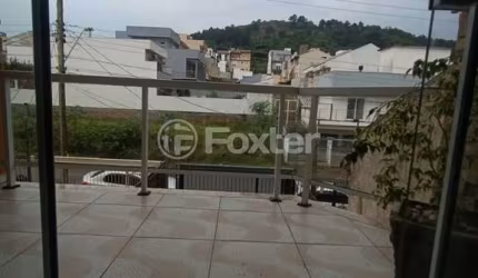 Casa com 3 quartos à venda na Rua Irmão Jaime Biazus, 83, Guarujá, Porto Alegre, 200 m2 por R$ 435.000