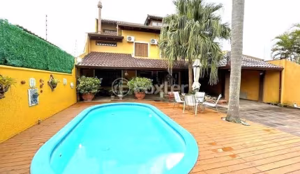 Casa com 3 quartos à venda na Avenida Orleaes, 492, Guarujá, Porto Alegre, 327 m2 por R$ 1.980.000