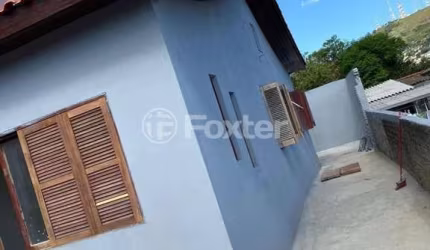 Casa com 4 quartos à venda na Rua Paulino Azurenha, 966, Partenon, Porto Alegre, 150 m2 por R$ 350.000