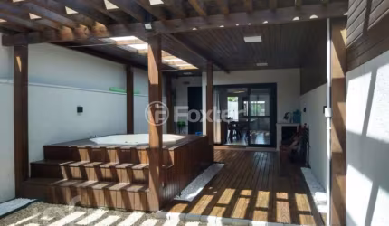 Casa com 3 quartos à venda na Rua Tarumã, 1, Enseada de Brito, Palhoça, 124 m2 por R$ 1.080.000