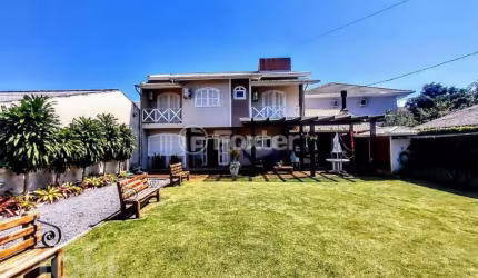 Casa com 3 quartos à venda na Rua Tucumã, 365, Enseada de Brito, Palhoça, 160 m2 por R$ 1.490.000