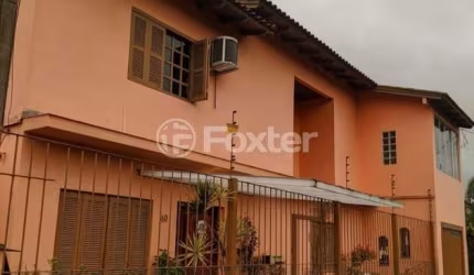 Casa com 4 quartos à venda na Beco Maria Alice, 40, Restinga, Porto Alegre, 300 m2 por R$ 477.000