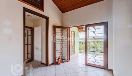 Casa com 6 quartos à venda na Rua Inhanduí, 193, Cristal, Porto Alegre, 279 m2 por R$ 1.300.000