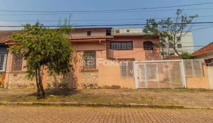 Casa com 4 quartos à venda na Rua Ponche Verde, 163, Medianeira, Porto Alegre, 438 m2 por R$ 598.000