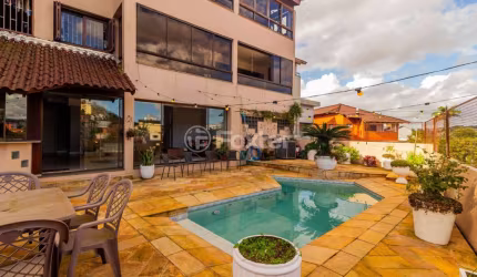 Casa com 4 quartos à venda na Rua Luiz Voelcker, 351, Três Figueiras, Porto Alegre, 350 m2 por R$ 1.650.000