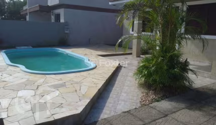 Casa com 3 quartos à venda na Rua Bolívia, 582, Zona Norte, Capão da Canoa, 110 m2 por R$ 650.000