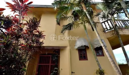 Casa com 3 quartos à venda na Rua Ruben Berta, 260, Jardim Leopoldina, Porto Alegre, 201 m2 por R$ 450.000