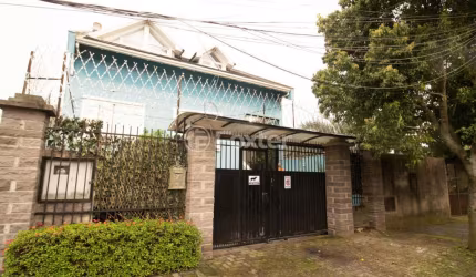 Casa com 3 quartos à venda na Rua Itapema, 156, Vila Jardim, Porto Alegre, 310 m2 por R$ 1.000.000