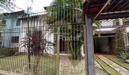 Casa com 4 quartos à venda na Rua São Caetano, 101, Marechal Rondon, Canoas, 360 m2 por R$ 1.000.000
