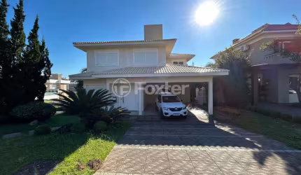Casa em condomínio fechado com 3 quartos à venda na Avenida Senador Salgado Filho, 8500, Querência, Viamão, 459 m2 por R$ 1.690.000
