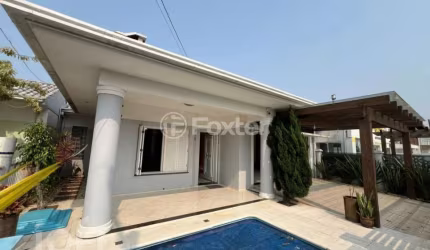 Casa com 3 quartos à venda na Avenida Flávio Boianovski, 918, Centro, Capão da Canoa, 172 m2 por R$ 1.280.000
