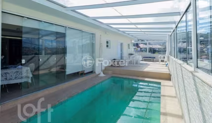 Casa com 4 quartos à venda na Rua Ivo Reis Montenegro, 46, Itaguaçu, Florianópolis, 200 m2 por R$ 1.990.000