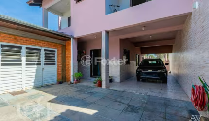 Casa com 5 quartos à venda na Rua das Camélias, 69, Igara, Canoas, 520 m2 por R$ 1.400.000