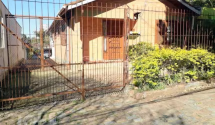 Casa com 3 quartos à venda na Rua São Mateus, 218, Jardim do Salso, Porto Alegre, 325 m2 por R$ 655.000