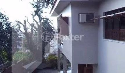 Casa com 3 quartos à venda na Rua Liberal, 97, Tristeza, Porto Alegre, 320 m2 por R$ 1.390.000