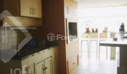 Casa com 3 quartos à venda na Rua Olécio Cavedini, 121, Espírito Santo, Porto Alegre, 300 m2 por R$ 890.000