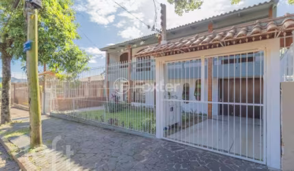 Casa com 4 quartos à venda na Rua Mathilde Zatar, 128, Nonoai, Porto Alegre, 300 m2 por R$ 795.000