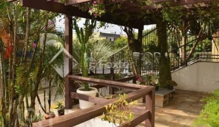 Casa com 4 quartos à venda na Rua Doutor Jorge Fayet, 501, Chácara das Pedras, Porto Alegre, 223 m2 por R$ 1.600.000