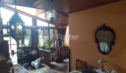 Casa com 3 quartos à venda na Avenida Martim Félix Berta, 2960, Mário Quintana, Porto Alegre, 163 m2 por R$ 790.000