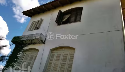 Casa com 2 quartos à venda na Rua Martim Minaberry, 432, Partenon, Porto Alegre, 250 m2 por R$ 478.000