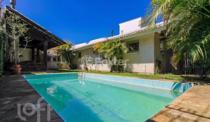 Casa com 3 quartos à venda na Rua Doutor Benjamin Camozato, 70, Jardim Isabel, Porto Alegre, 200 m2 por R$ 1.160.000