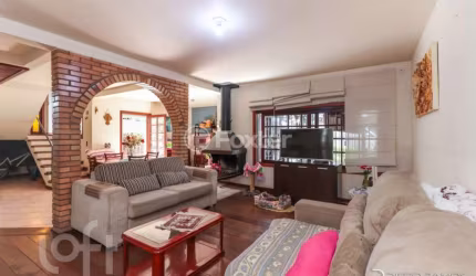 Casa com 3 quartos à venda na Avenida América, 268, Auxiliadora, Porto Alegre, 262 m2 por R$ 1.400.000