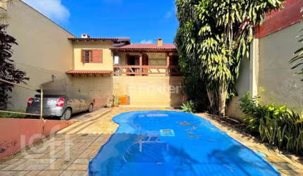 Casa com 4 quartos à venda na Rua Francisca Lechner, 343, Parque Santa Fé, Porto Alegre, 263 m2 por R$ 650.000