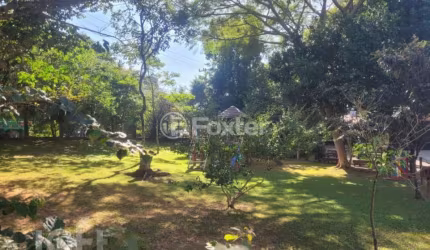 Casa em condomínio fechado com 4 quartos à venda na Rodovia Doutor Antônio Luiz Moura Gonzaga, 383, Rio Tavares, Florianópolis, 200 m2 por R$ 2.950.000