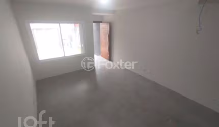 Casa com 3 quartos à venda na Rua Itacyr Rossi, 31, Guarujá, Porto Alegre, 122 m2 por R$ 560.000