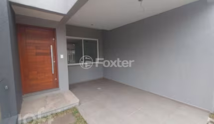 Casa com 3 quartos à venda na Rua Itacyr Rossi, 33, Guarujá, Porto Alegre, 122 m2 por R$ 559.000