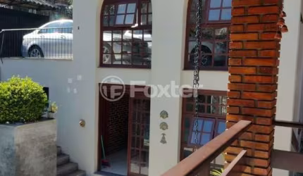 Casa com 3 quartos à venda na Rua dos Minuanos, 285, Espírito Santo, Porto Alegre, 291 m2 por R$ 1.100.000