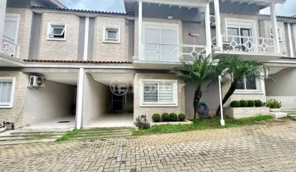 Casa em condomínio fechado com 3 quartos à venda na Rua Tenente Antônio João, 845, Nossa Senhora das Graças, Canoas, 171 m2 por R$ 691.500