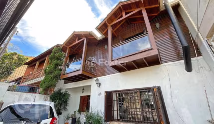 Casa com 5 quartos à venda na Rua Mata Coelho, 98, Nonoai, Porto Alegre, 200 m2 por R$ 600.000