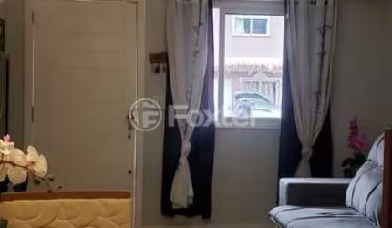 Casa em condomínio fechado com 2 quartos à venda na Rua Giobatta Giuseppe Petracco, 411, Vila Nova, Porto Alegre, 96 m2 por R$ 299.000
