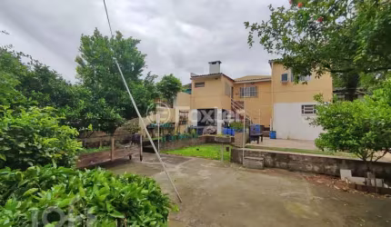 Casa com 3 quartos à venda na Rua Doze de Outubro, 520, Partenon, Porto Alegre, 116 m2 por R$ 519.000