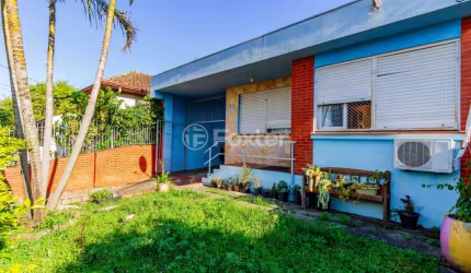 Casa com 3 quartos à venda na Rua General Solon, 255, Jardim Itu Sabará, Porto Alegre, 266 m2 por R$ 700.000