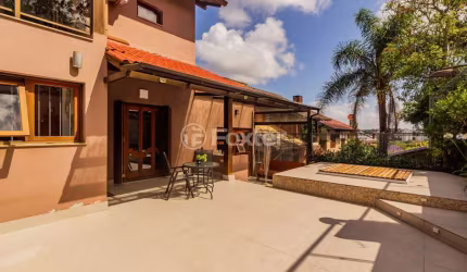 Casa em condomínio fechado com 3 quartos à venda na Avenida Vicente Monteggia, 2000, Cavalhada, Porto Alegre, 260 m2 por R$ 1.224.000