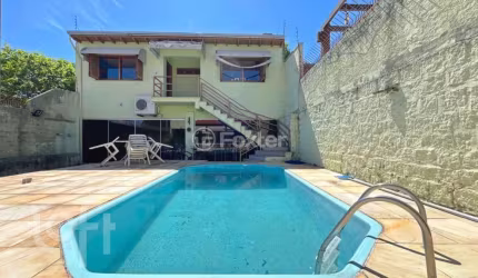 Casa com 4 quartos à venda na Rua São Sebastião do Cai, 50, Camaquã, Porto Alegre, 235 m2 por R$ 749.000