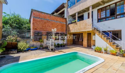 Casa com 3 quartos à venda na Rua Vinte e Seis de Dezembro, 648, Vila São José, Porto Alegre, 186 m2 por R$ 550.000