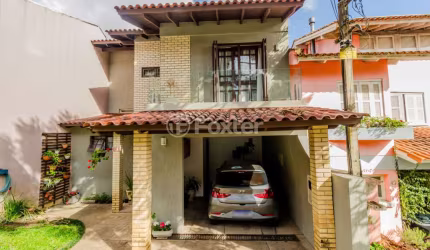 Casa em condomínio fechado com 3 quartos à venda na Rua Erechim, 100, Nonoai, Porto Alegre, 187 m2 por R$ 750.000