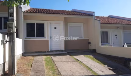 Casa em condomínio fechado com 2 quartos à venda na Rua Oscar Schick, 2350, Formoza, Alvorada, 66 m2 por R$ 259.000