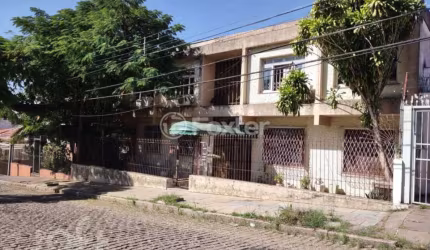 Apartamento com 2 quartos à venda na Rua Doutor Voltaire Pires, 744, Santo Antônio, Porto Alegre, 64 m2 por R$ 210.000