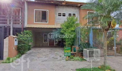 Casa em condomínio fechado com 3 quartos à venda na Rua Pau-Brasil, 581, Hípica, Porto Alegre, 142 m2 por R$ 580.000