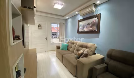 Casa em condomínio fechado com 2 quartos à venda na Rua Santa Eulália, 57, Olaria, Canoas, 57 m2 por R$ 325.000