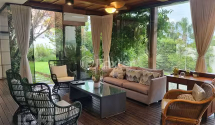 Casa em condomínio fechado com 4 quartos à venda na Estrada Haroldo Soares Glavan, 4858, Cacupé, Florianópolis, 392 m2 por R$ 3.800.000